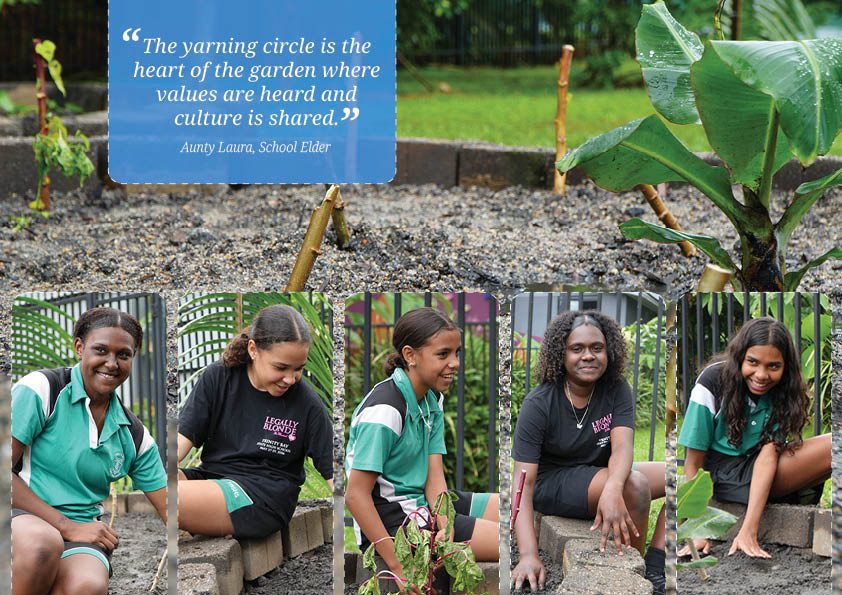 Four First Nations girls sitting on the edges of a raised garden bed tending to the small seedlings they've planted.